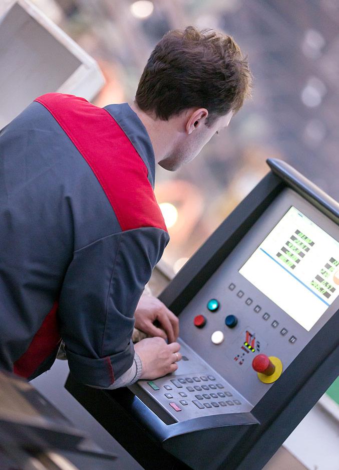 Image of repair technician performing machine service